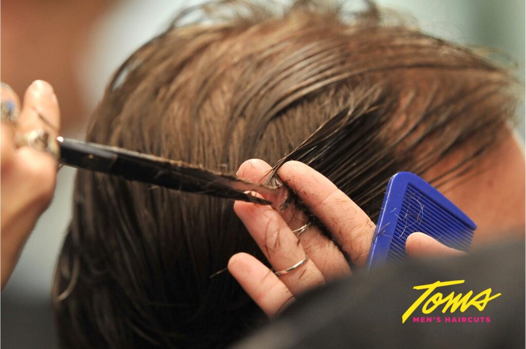 close-up of a client getting a haircut